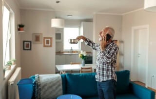 man calling landlord for roofing problems